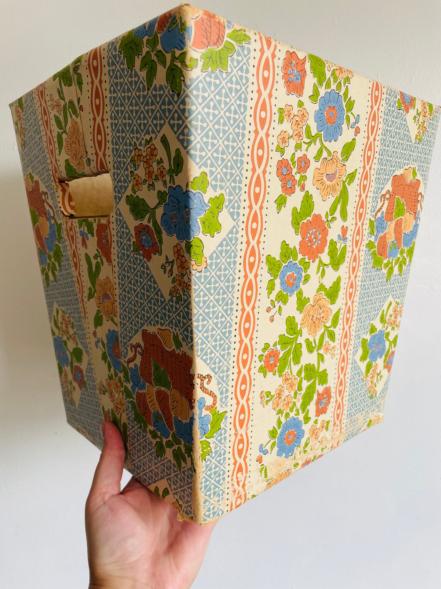 Retro Cardboard Box Trash Can with Flower Pattern Design - Used to Collect Fabric Scraps in a Sewing Crafting Room