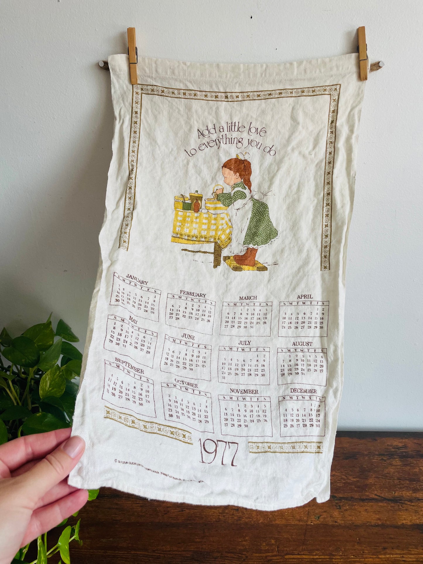 1977 Calendar Holly Hobbie Tea Towel - Carleton Cards Limited - Add a Little Love to Everything You Do