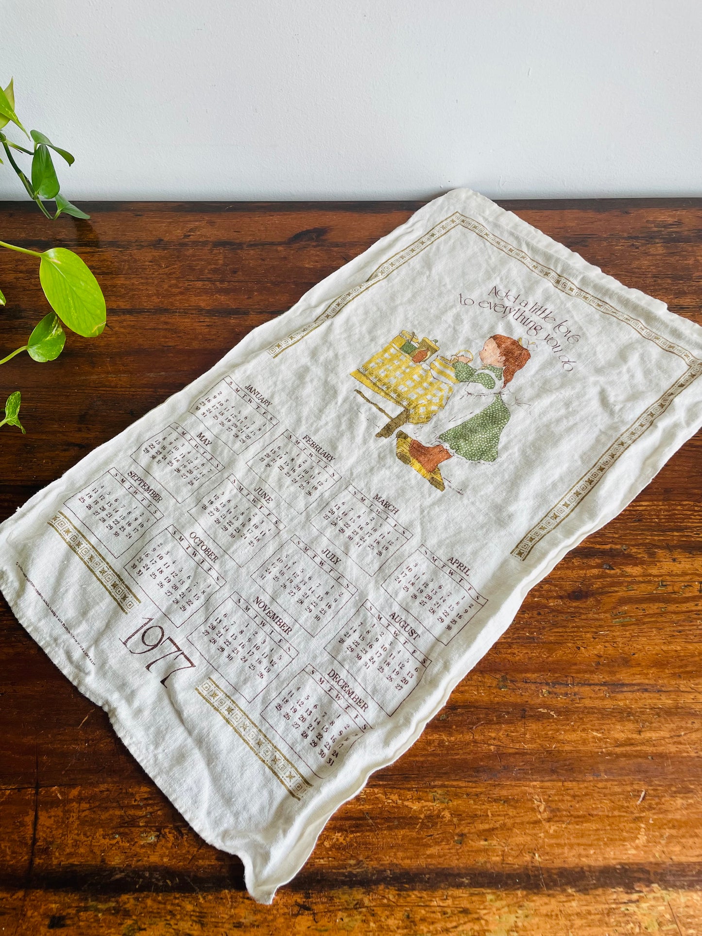1977 Calendar Holly Hobbie Tea Towel - Carleton Cards Limited - Add a Little Love to Everything You Do
