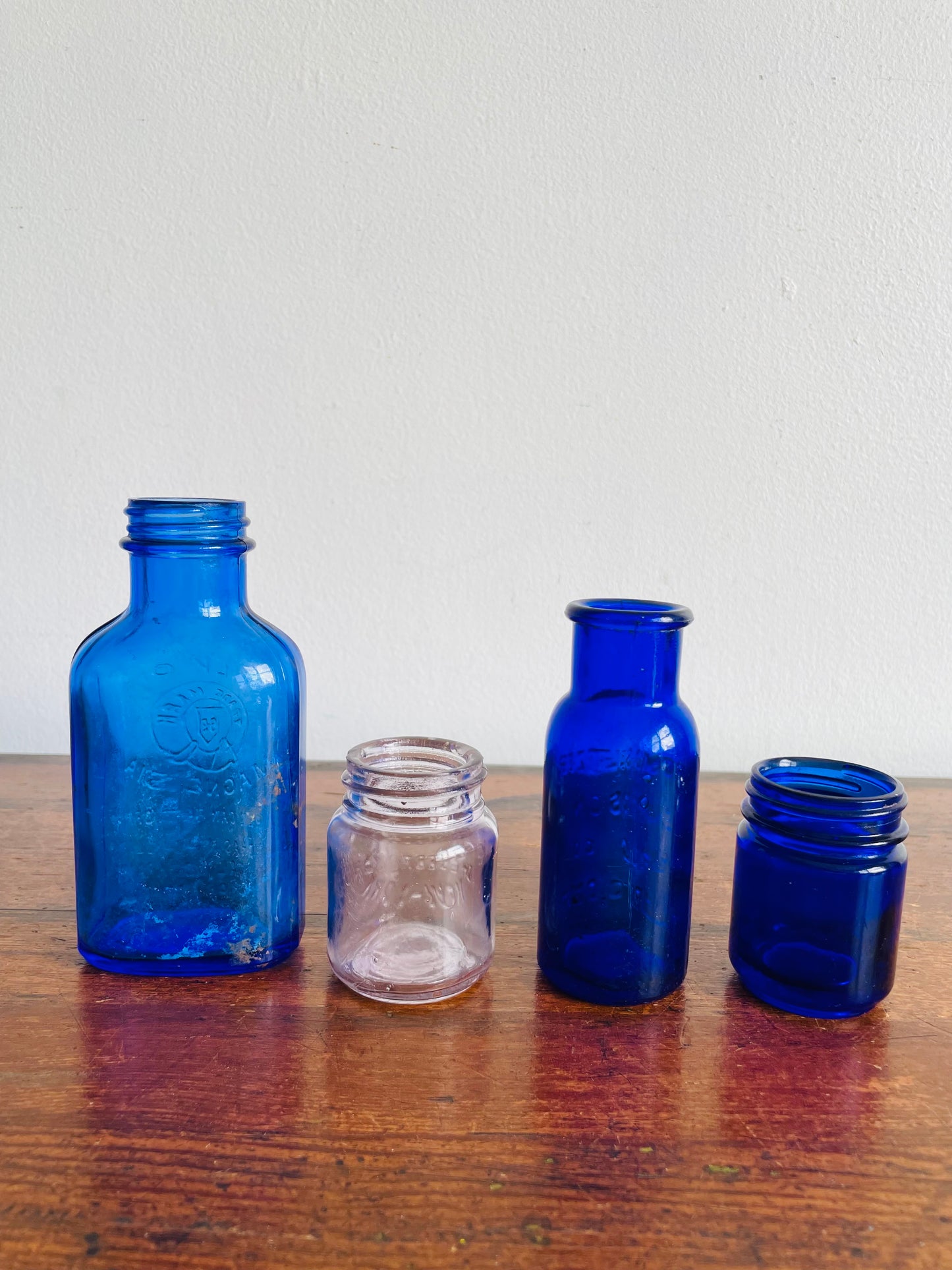 Instant Collection of Cobalt Blue & Clear Medicinal Glass Bottles - Set of 4 - Milk of Magnesia, Bromoseltzer, Vaseline & Vicks