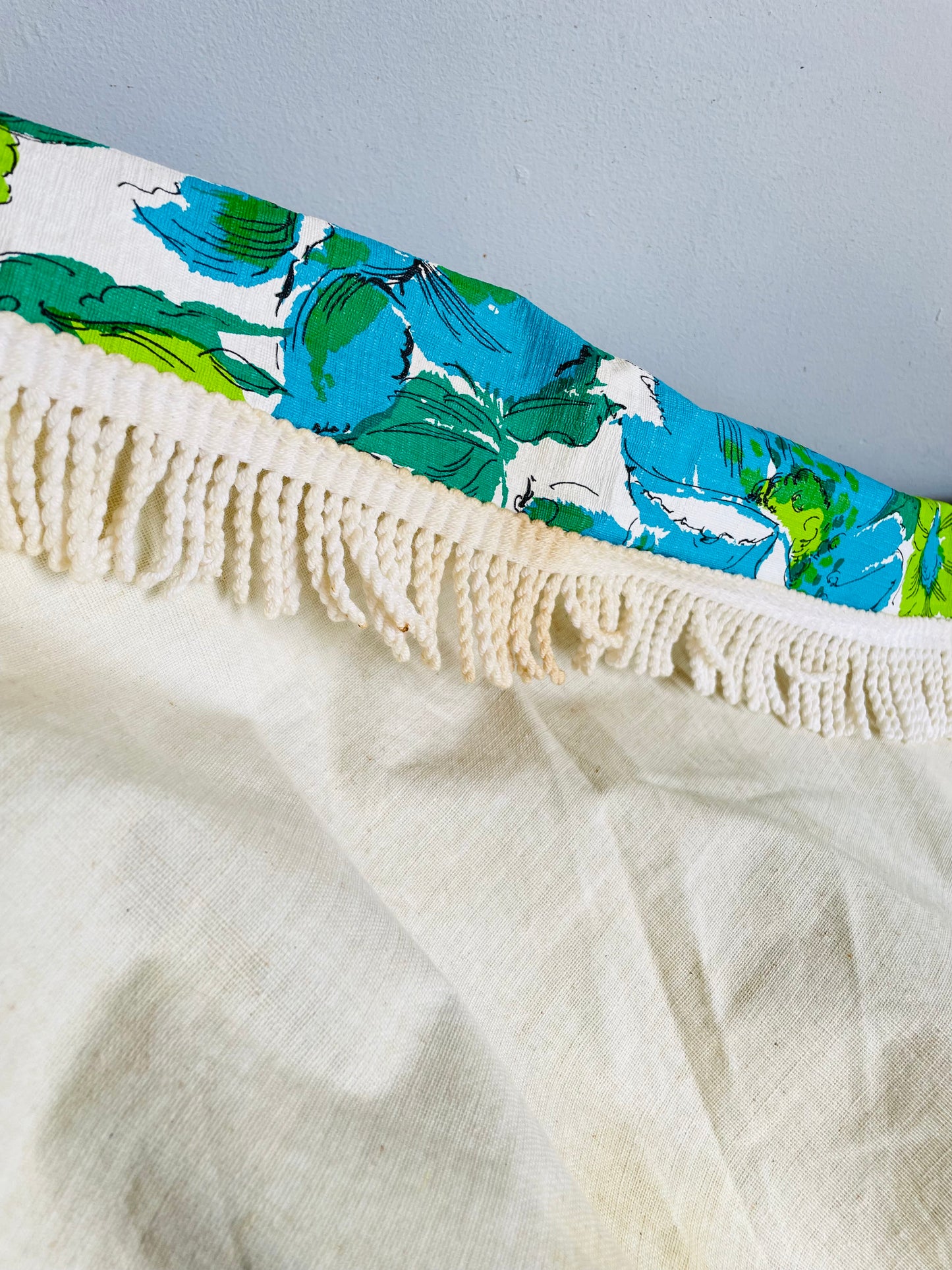 Vintage 1960s/70s Groovy & Fun Green & Blue Flower Power 44" Round Vinyl Patio Tablecloth with Umbrella Hole & White Braided Tassel Fringe