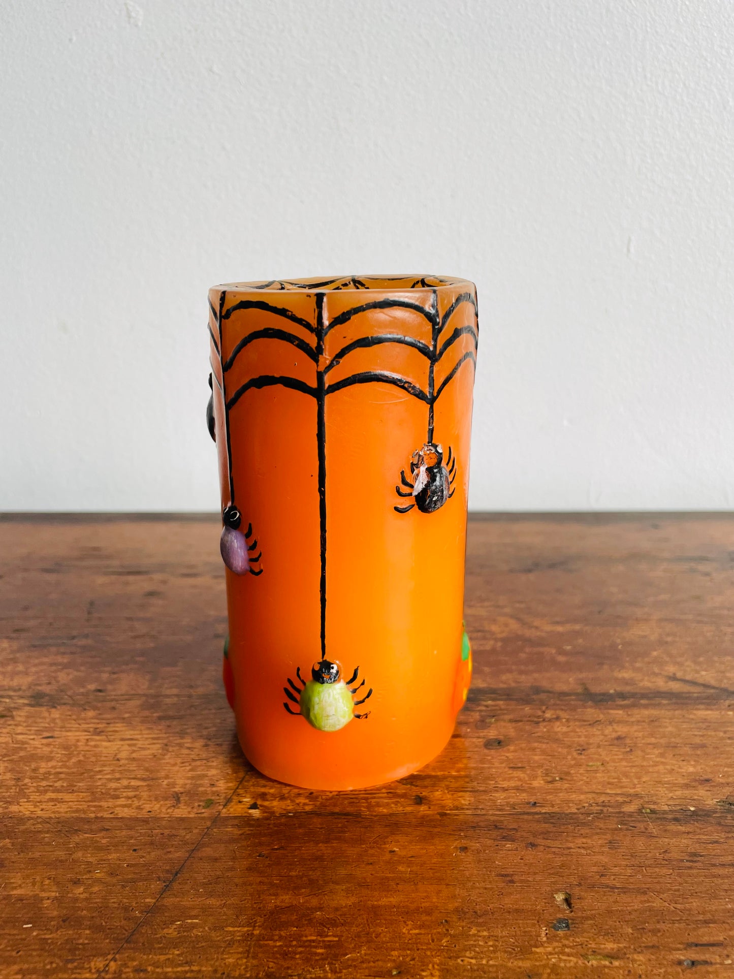 Orange Halloween Candle with Spiders, Web & Jack-o-Lanterns