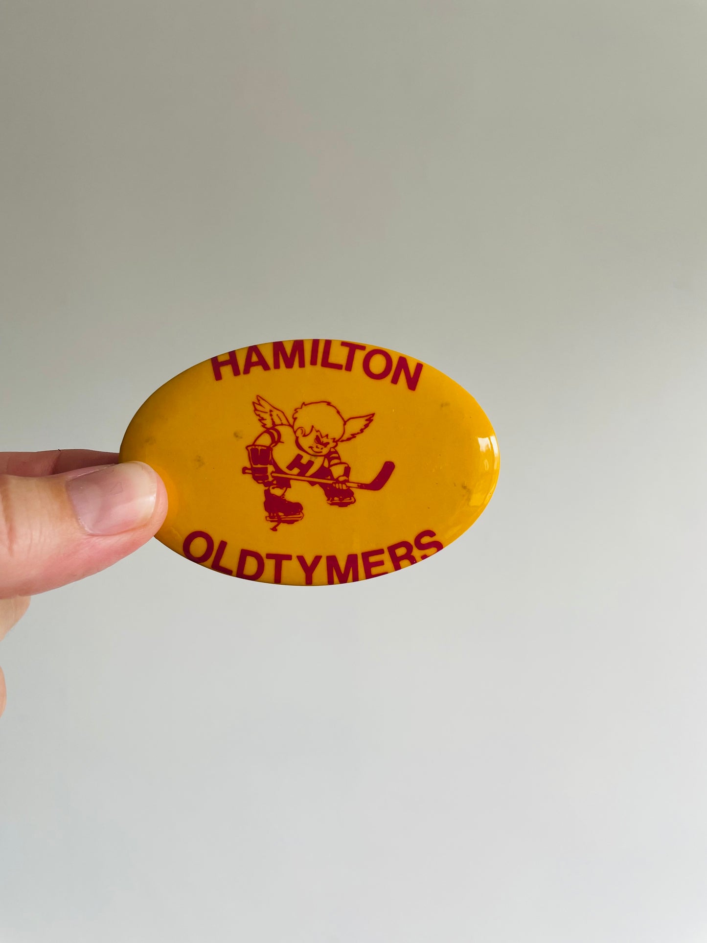 Vintage Metal Hockey Button Pin - Hamilton Oldtymers - Yellow Oval #2