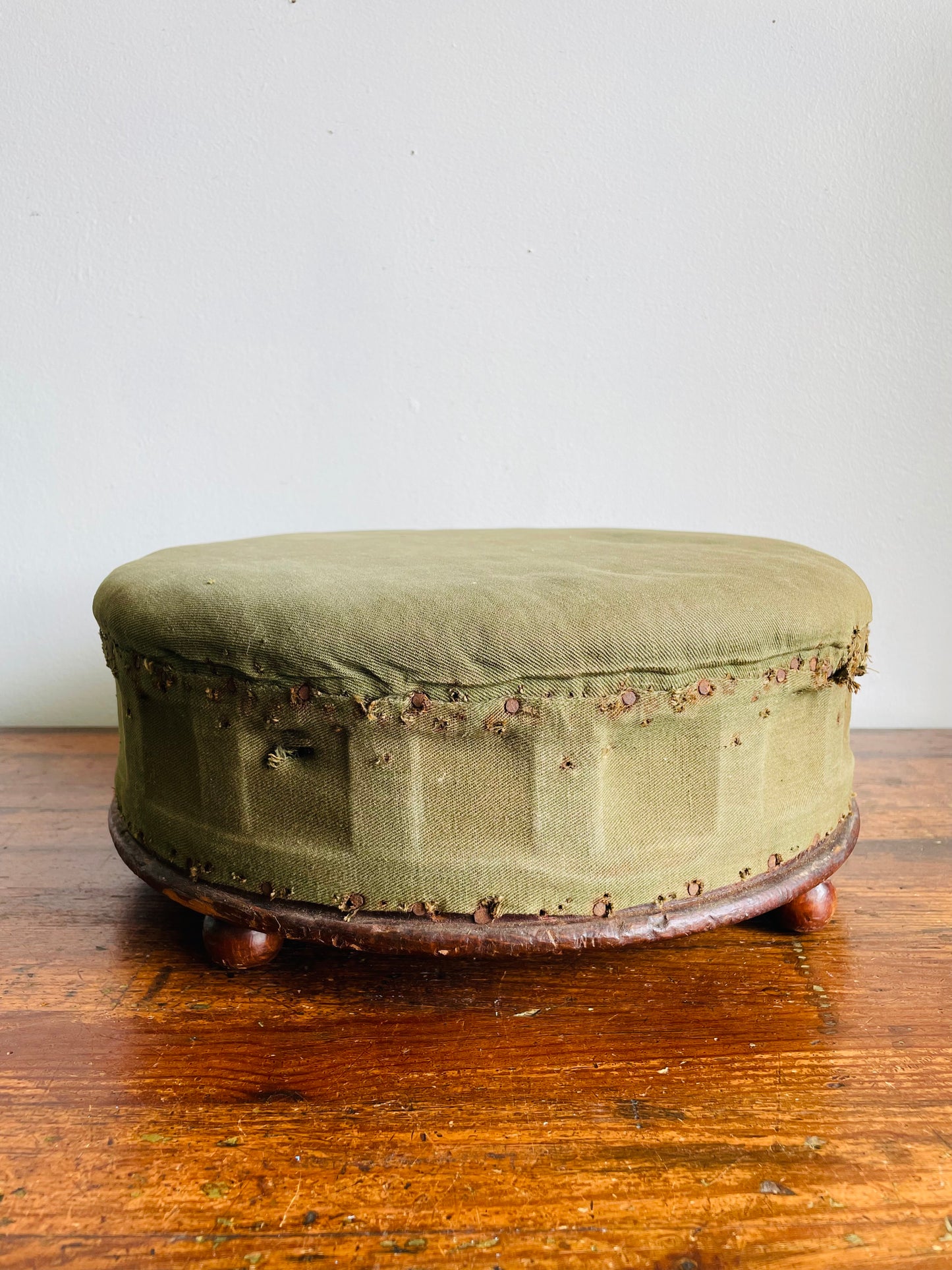 Antique Round Green Straw Stuffed Footstool with Solid Wood Base & Knob Feet
