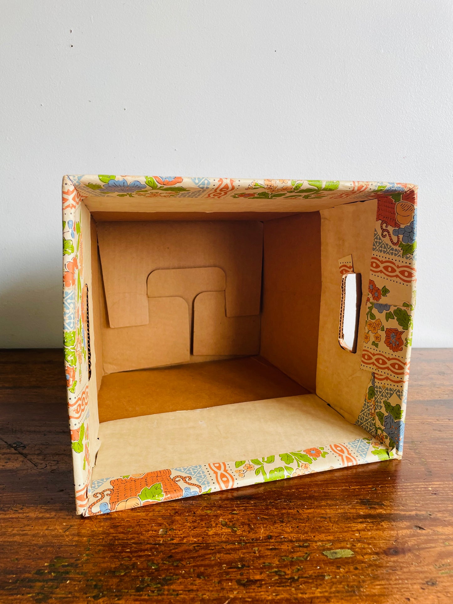Retro Cardboard Box Trash Can with Flower Pattern Design - Used to Collect Fabric Scraps in a Sewing Crafting Room