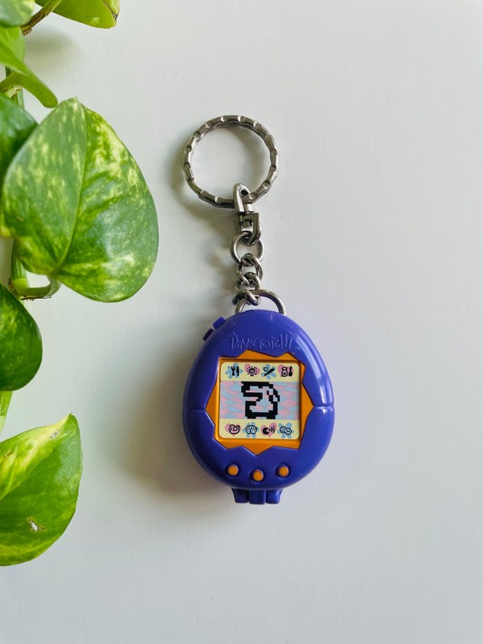 Vintage 1997 McDonald's Purple Toy Tamagotchi Keychain #2 - Opens Up / Storage Compartment