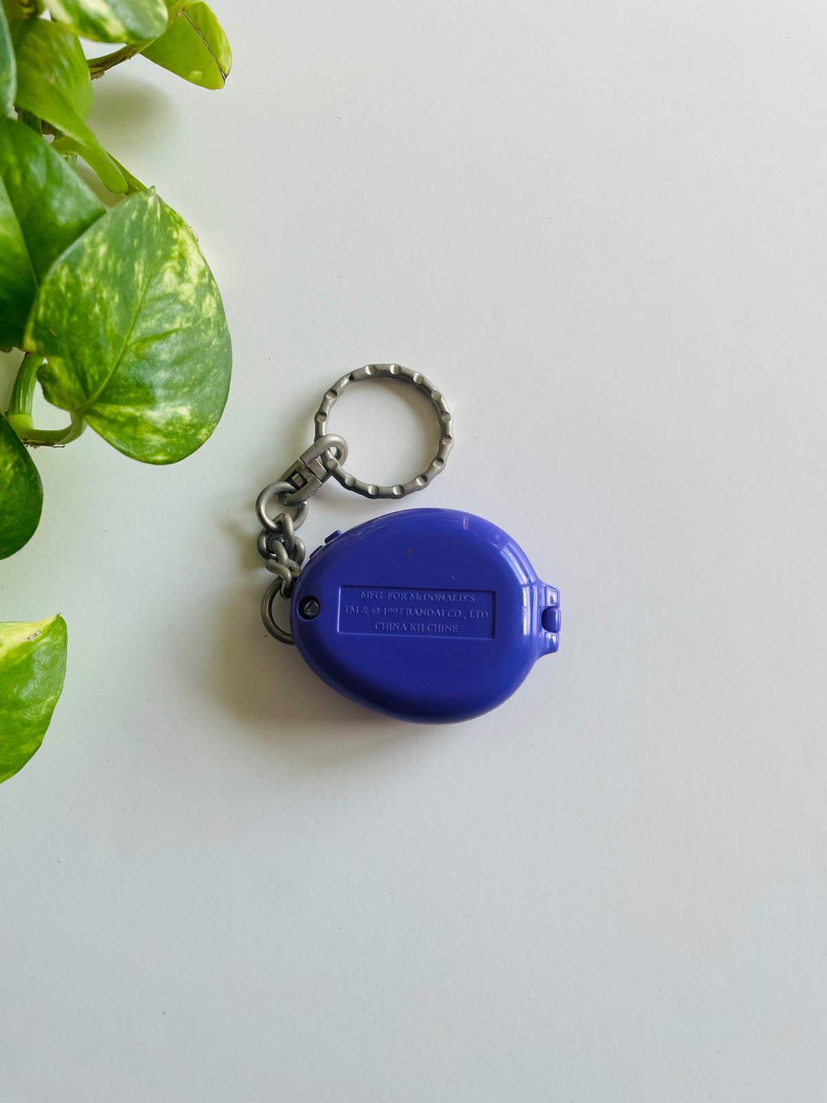 Vintage 1997 McDonald's Purple Toy Tamagotchi Keychain #1 - Opens Up / Storage Compartment