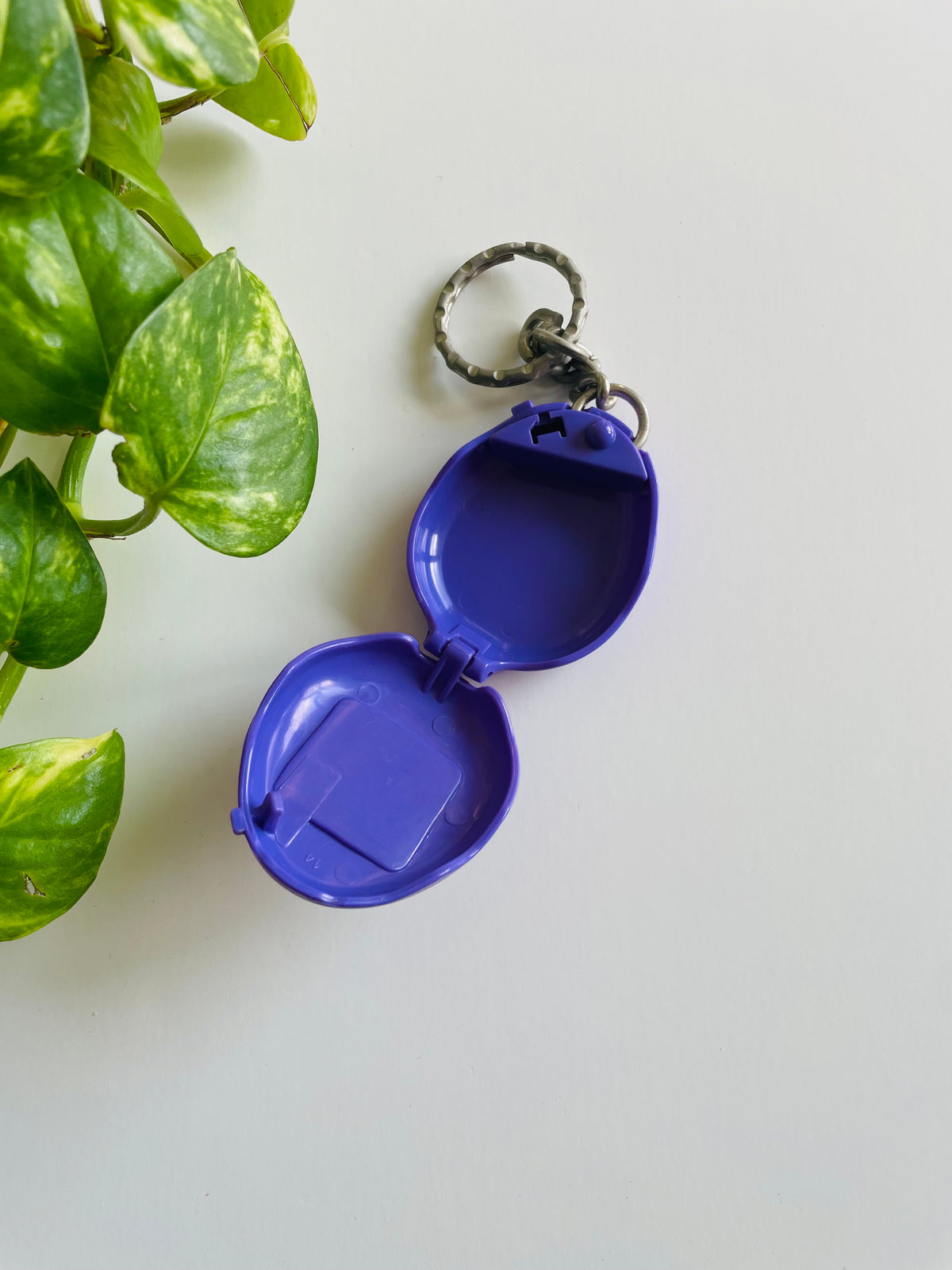 Vintage 1997 McDonald's Purple Toy Tamagotchi Keychain #1 - Opens Up / Storage Compartment