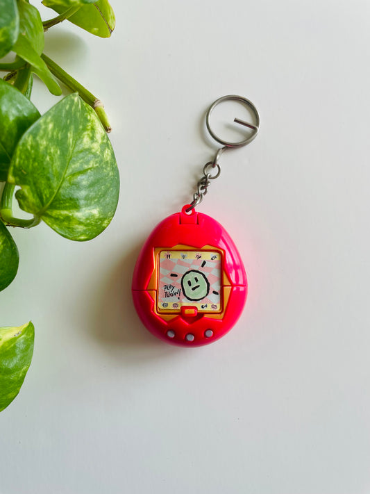 Vintage 1997 McDonald's Happy Meal Toy Pink Tamagotchi Keychain - Opens Up / Storage Compartment