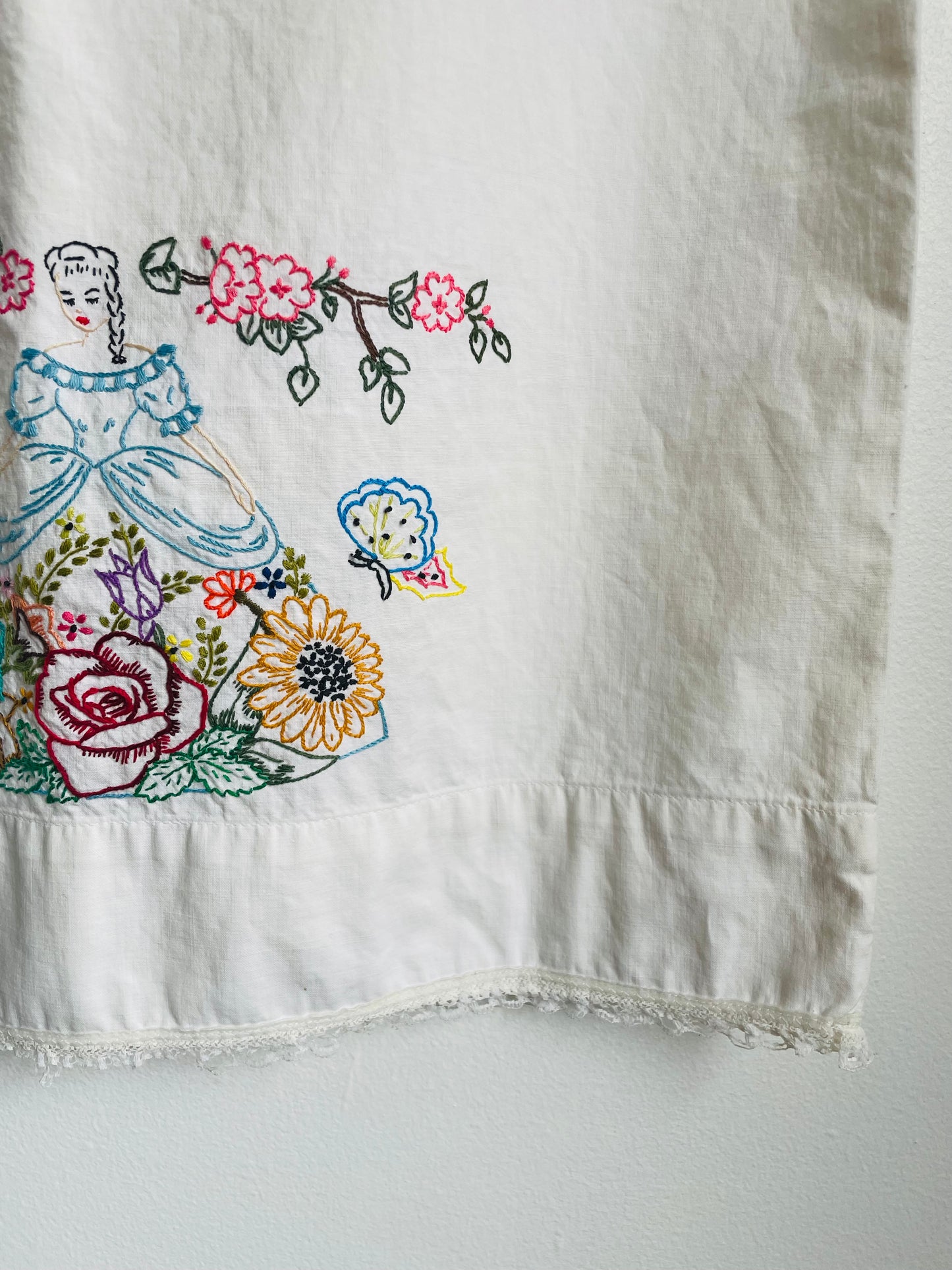 White Cotton Pillowcase with Embroidered Woman, Flowers, and a Butterfly